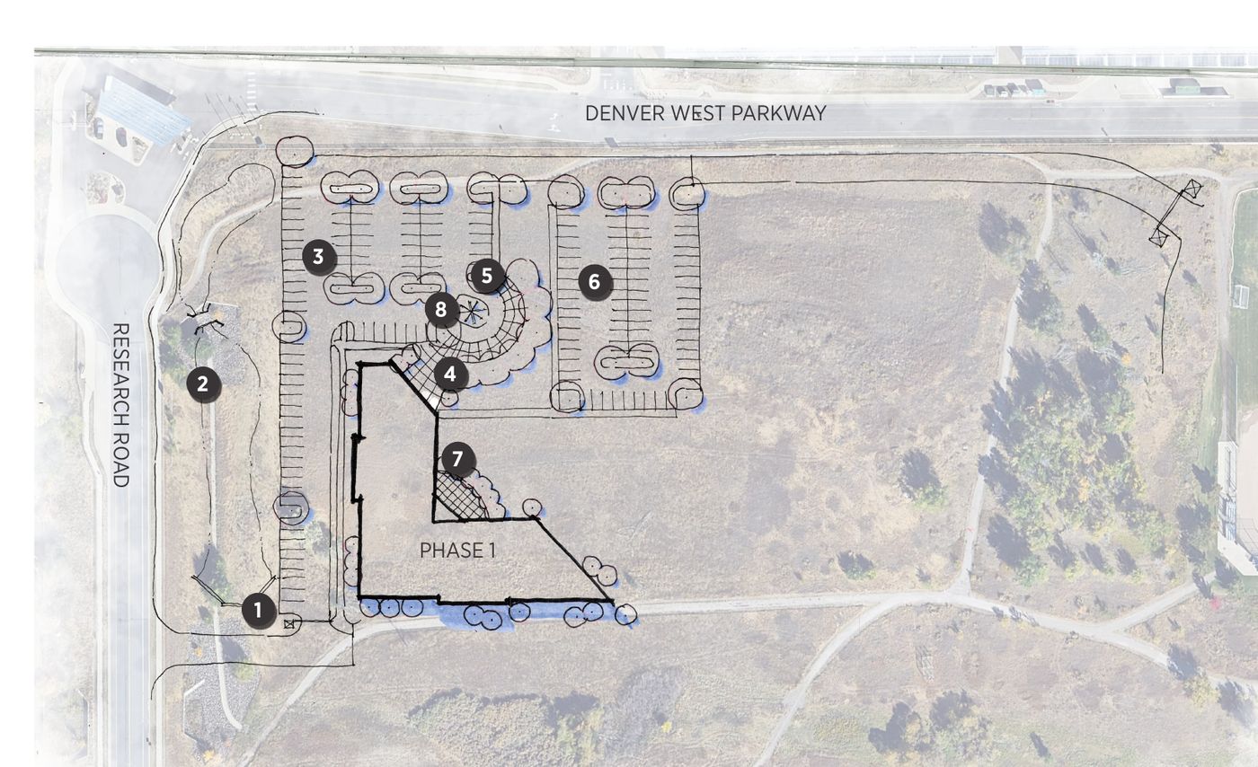 Concept site plan of Phase 1, an L-shaped three-story building at the corner of Denver West Parkway and Research Road with parking to the north